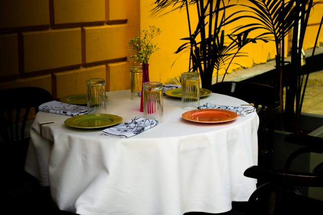 Tableware on White Table Cloth