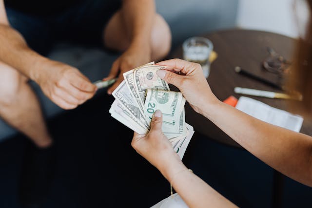 person counting cash
